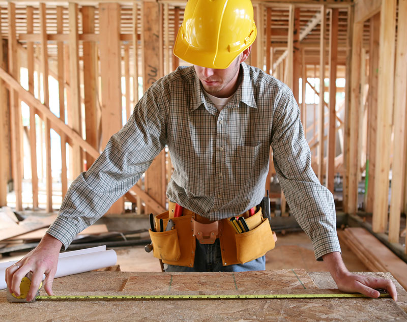 Technician sanitizing damaged area